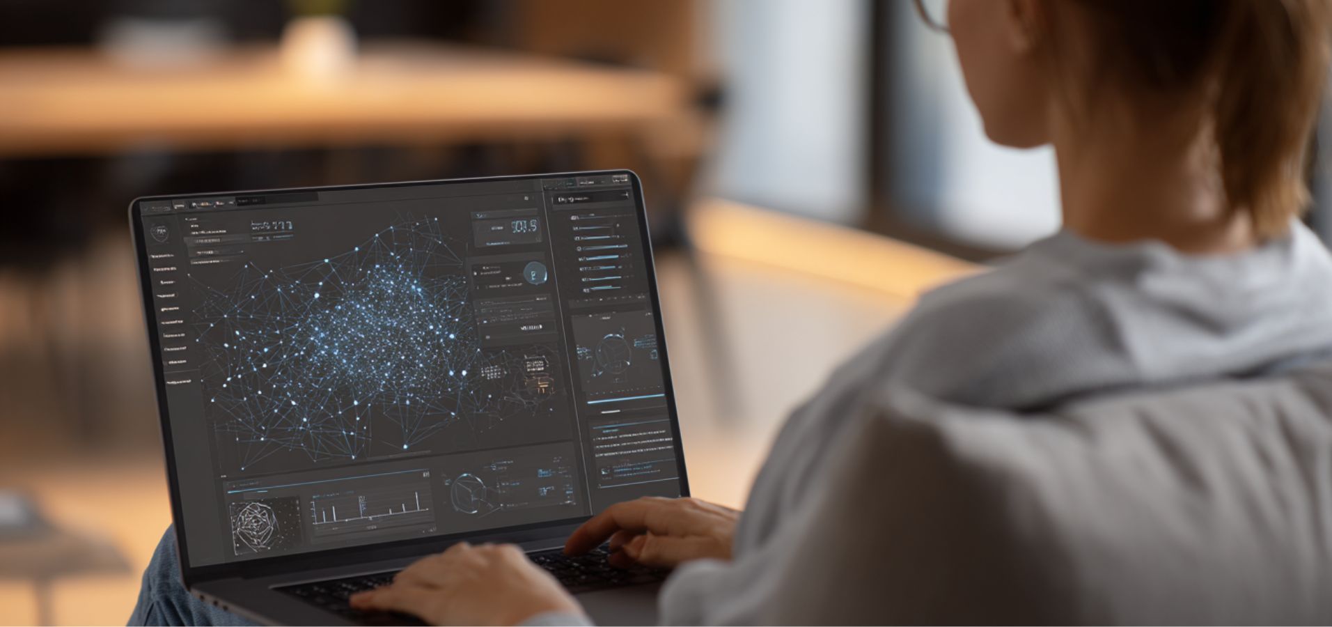 Person analyzing data on laptop representing different types of contract